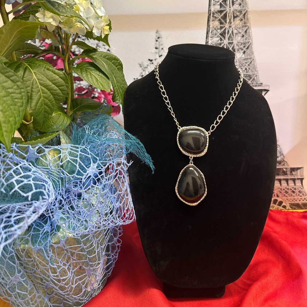 silver tone necklace with Black Stones